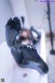 A pair of black shoes sitting on top of a white table.